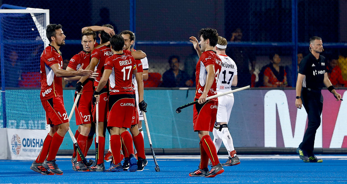 Olympic silver medallist Belgium defeated two-time champions Germany 2-1 in the  quarters of the hockey World Cup.