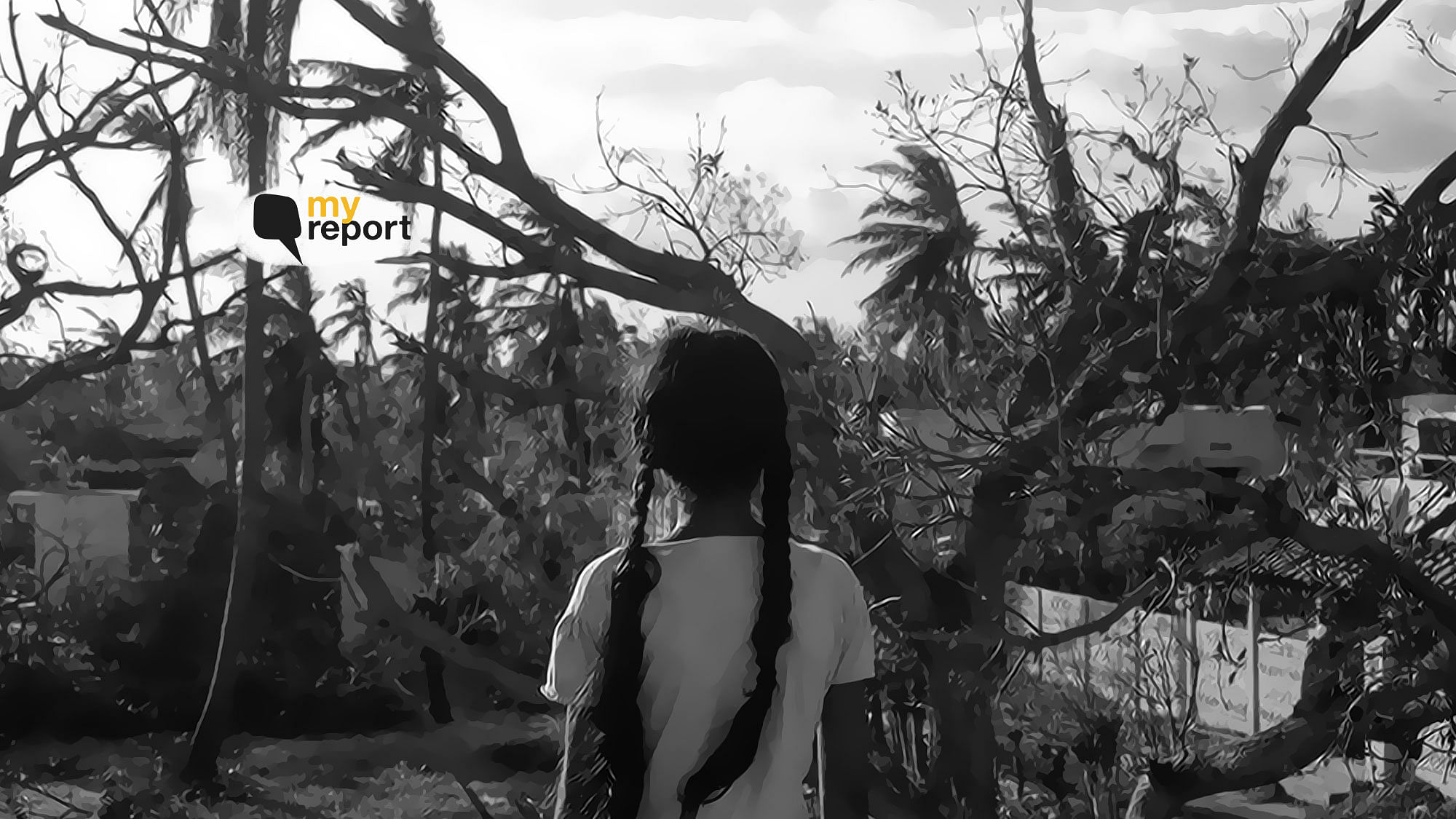 A young girl named Kavishri overlooks the damage caused to her house by Cyclone Gaja.&nbsp;