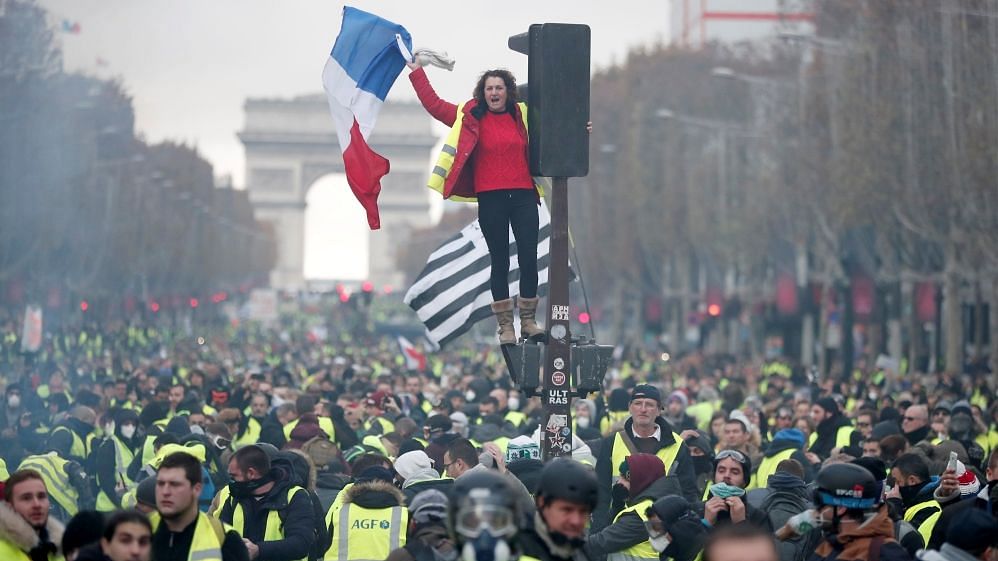 A ‘Yellow vest’ protest against higher fuel prices, on the Champs-Elysees in Paris.