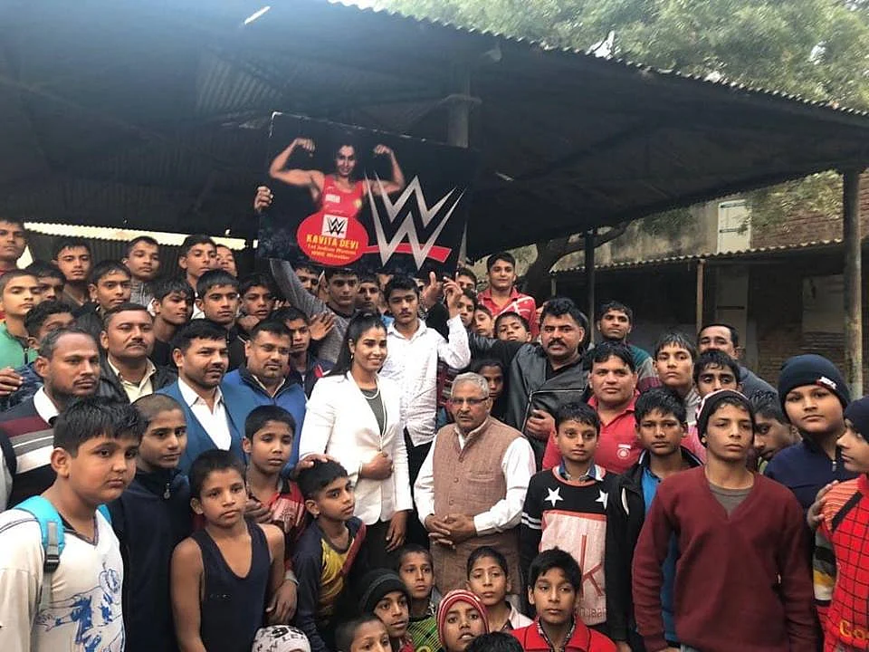 Kavita Devi with fans back home in India.