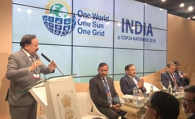 Katowice: Union Minister for Science & Technology, Earth Sciences and Environment, Forest & Climate Change, Dr. Harsh Vardhan addresses at the inauguration of the Indian Pavilion at COP24 in Katowice, Poland on Dec 3, 2018. Also seen Ministry of Environment, Forest and Climate Change Secretary C.K. Mishra. (Photo: IANS/PIB)