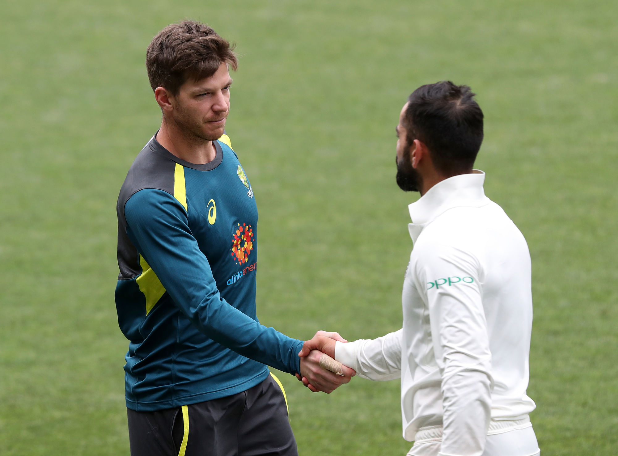 Australian captain Tim Paine, left, congratulates India’s captain Virat Kohli after India won the first cricket test by 31 runs in Adelaide, Australia, Monday, Dec. 10, 2018.