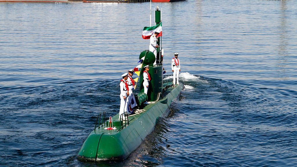 Iran’s navy members stand on Ghadir-942 submarine in southern port of Bandar Abbas, Iran, at the mouth of the strategic Strait of Hormuz on 29 November 2018. 
