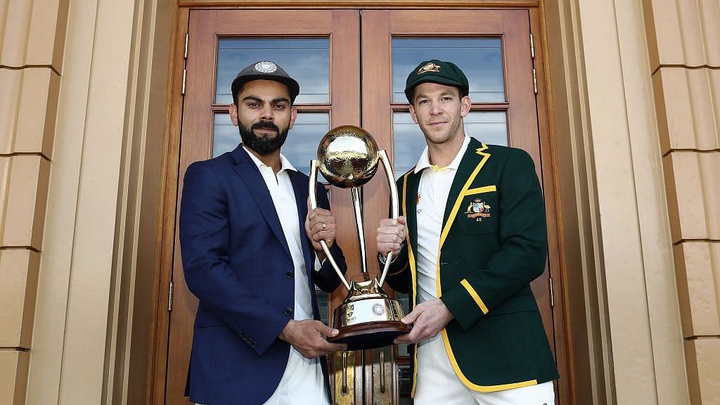 File: Captains Virat Kohli and Tim Paine pose with the trophy ahead of India’s opening Test vs Australia at Adelaide.