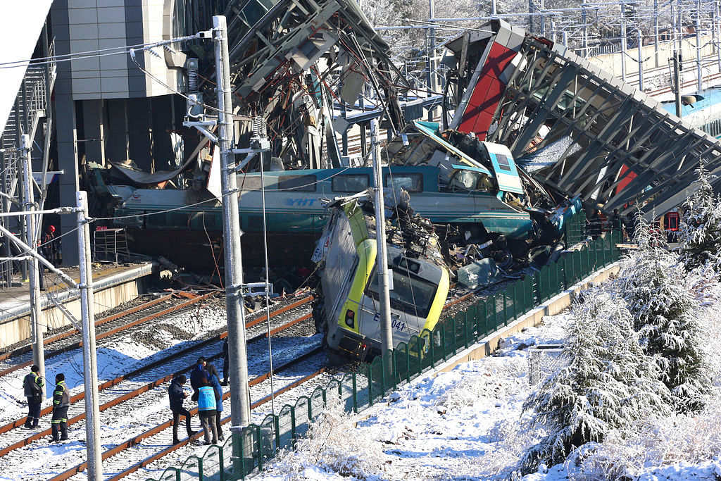 A high-speed train hit a railway engine and crashed into a pedestrian overpass ON Thursday, 18 December at a station in the Turkish capital of Ankara, killing nine people and injuring dozens.