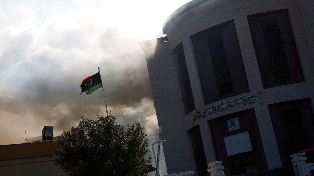 Smoke rises shortly after an attack on the foreign ministry building in Tripoli.