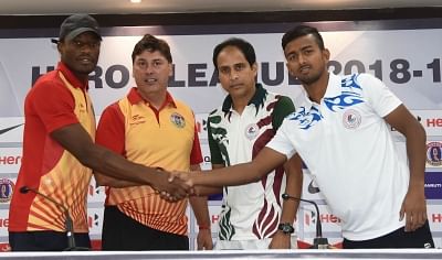 File picture of East Bengal FC player Kassim Aidara and coach Alejandro Menendez with Mohun Bagan AC former coach Sankarlal Chakraborty and player Azharuddin Mallick.