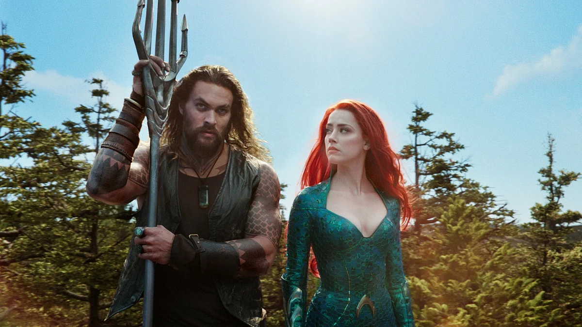 Jason Momoa and Amber Heard in <i>Aquaman.</i>