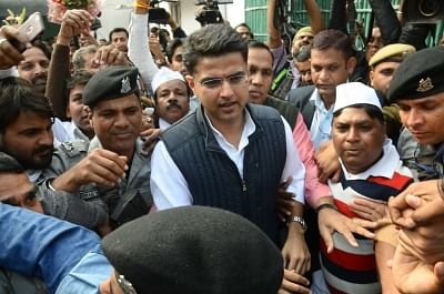 Jaipur: Rajasthan Congress President Sachin Pilot being greeted by party workers outside his residence in Jaipur on Dec 11, 2018. (Photo: IANS)