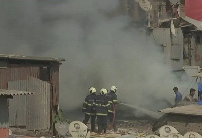 Firefighters at work in South Mumbai. 