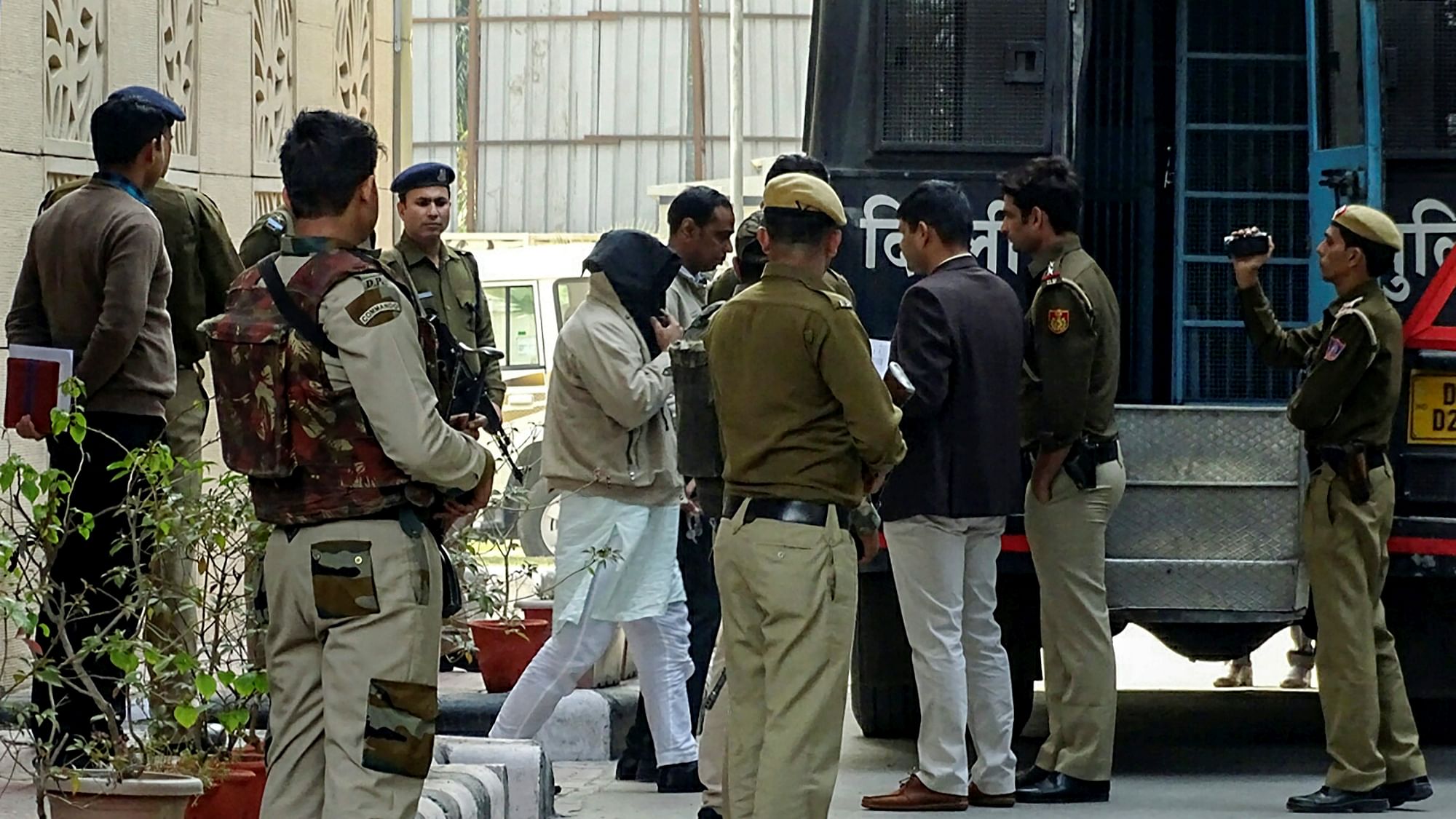 The 10 accused arrested in ISIS case being taken to court from the NIA headquarter in New Delhi