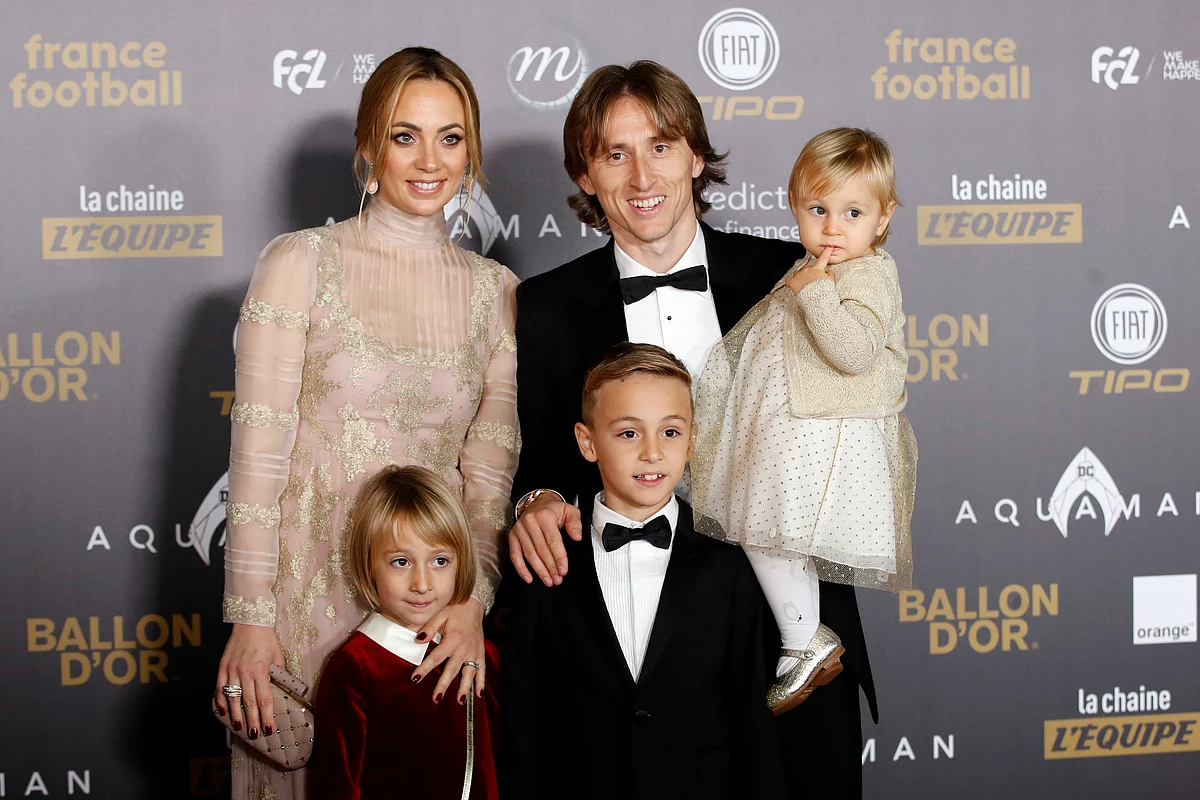 Real Madrid’s Luka Modric arrives with his family for the Golden Ball, “Ballon d’Or” award ceremony at the Grand Palais in Paris.