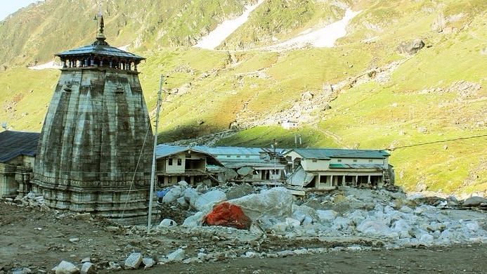 Kedarnath temple with destroyed houses following the 2013 flood disaster. Image used for representation.