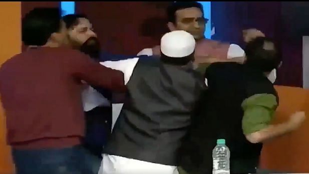 Samajwadi Party spokesperson Anurag Bhadoria and his BJP counterpart Gaurav Bhatia scuffled with each other during a live debate.