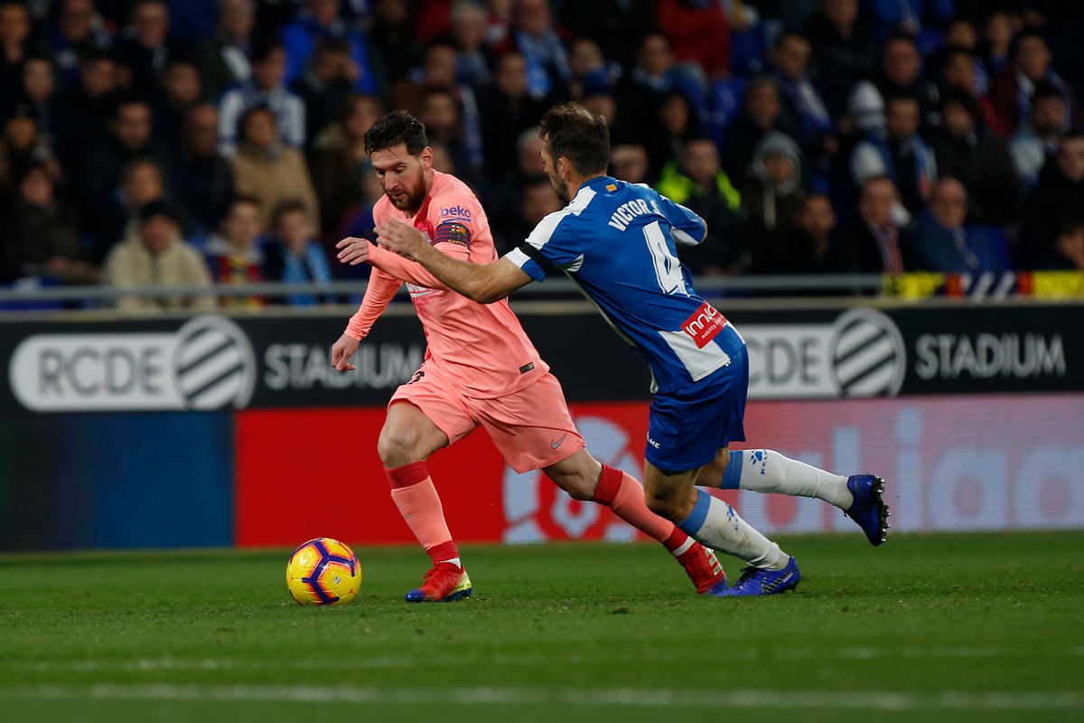 Messi’s perfectly struck free kicks led Barcelona to a 4-0 rout of Espanyol in the Spanish league on Saturday.