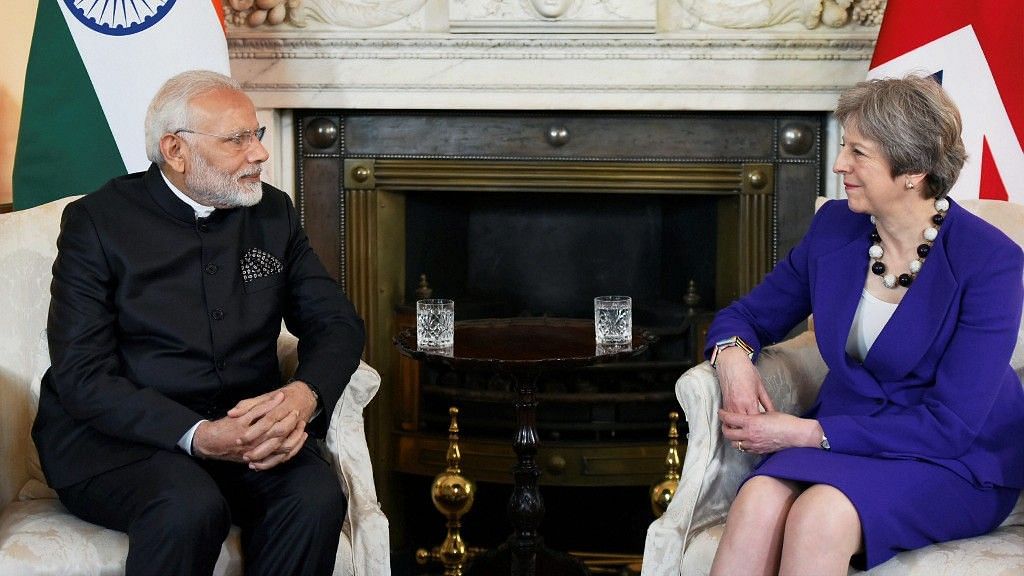 PM Modi with UK Prime Minister Theresa May in London.