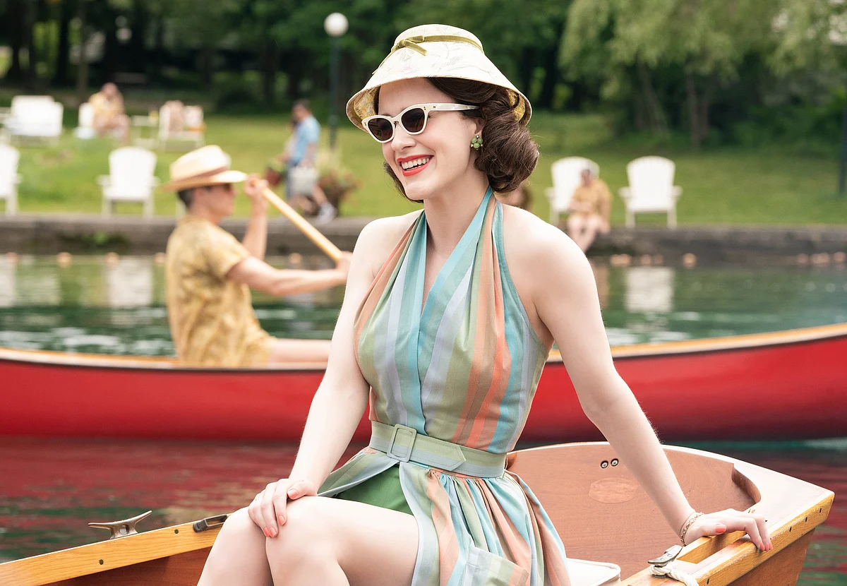 Donna Zakowska’s costumes are another returning feature.