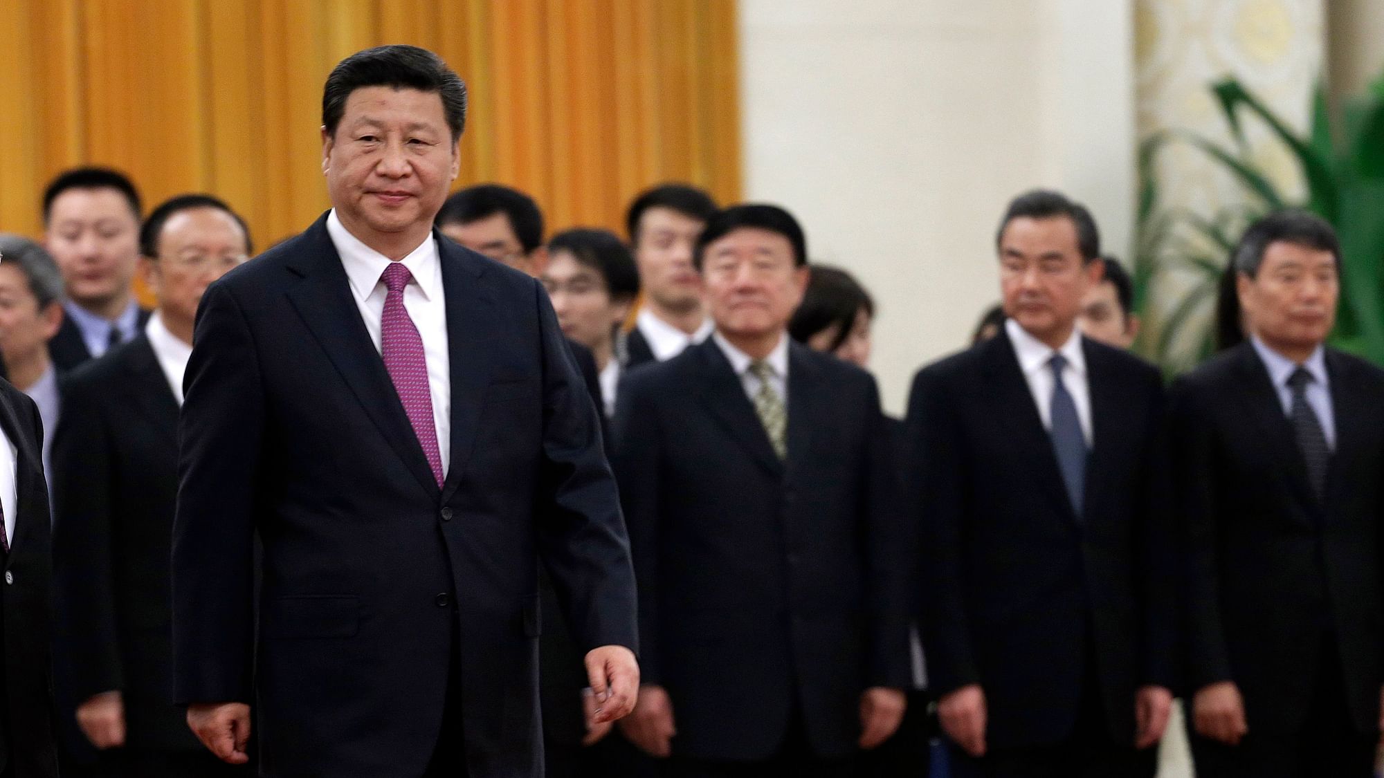 File photo of China’s President Xi Jinping in front of Chinese senior officials during a welcoming ceremony at the Great Hall of the People in Beijing.