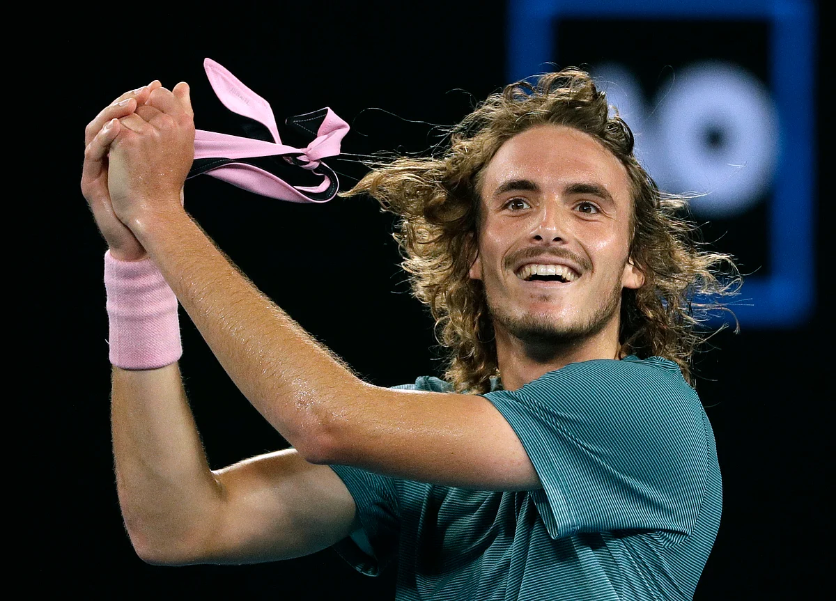 Greece’s Stefanos Tsitsipas celebrates after defeating Switzerland’s Roger Federer in their fourth round match at the Australian Open. 