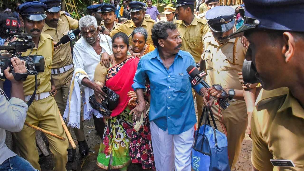 Devotees enter Kerala’s Sabarimala Temple after the gates were opened  to all devotees, including mentruating women.