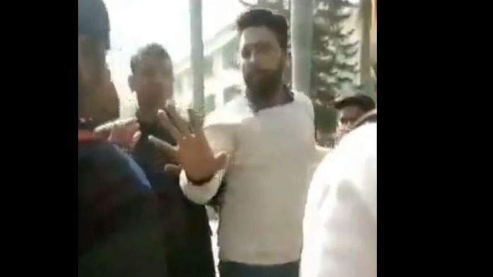 NSUI Shahjahanpur District President Irfan Hussain was caught on camera purportedly threatening a female student.