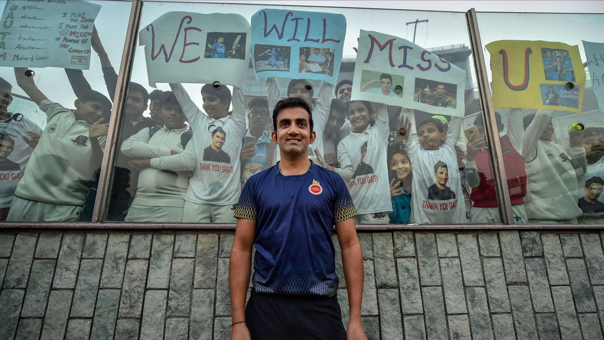 Cricketer Gautam Gambhir poses for photos with his fans in his last cricket match before retirement.
