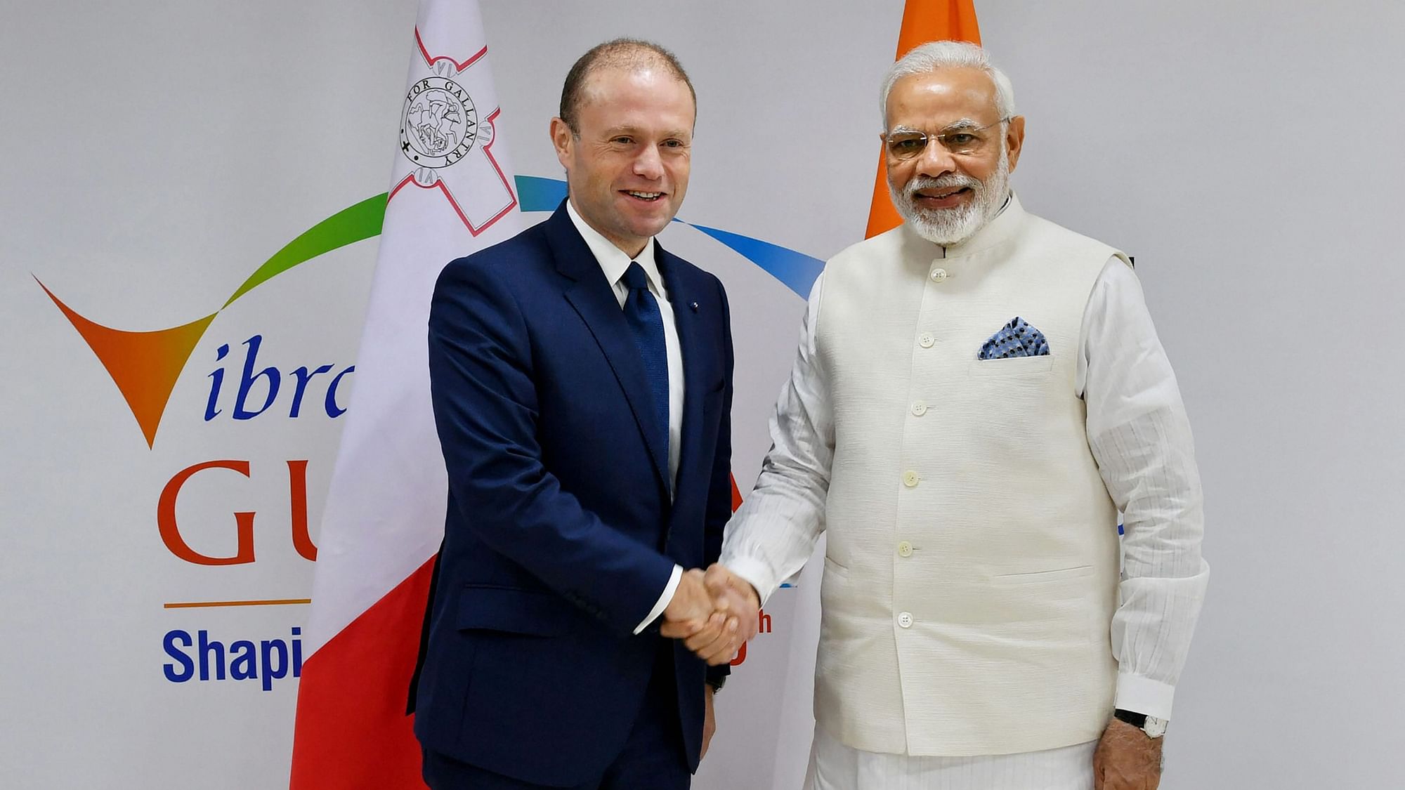  Prime Minister Narendra Modi shakes hands with his Maltese counterpart Joseph Muscat on the sidelines of Vibrant Gujarat in Gandhinagar on Friday.&nbsp;