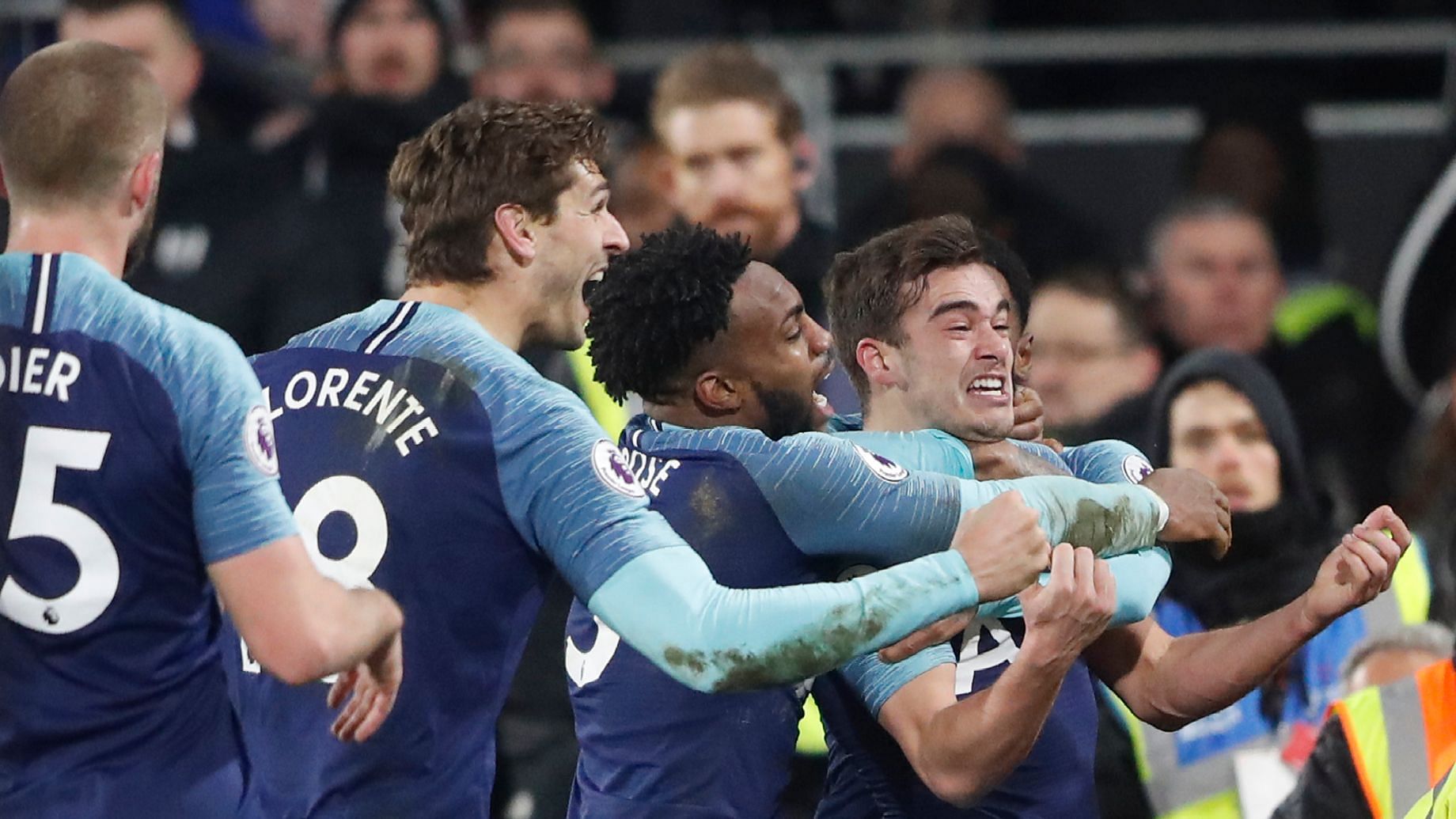 Tottenham Hotspur players are jubilant after Harry Winks’ (right) 93rd-minute goal handed Spurs a 2-1 win over Fulham in the Premier League.