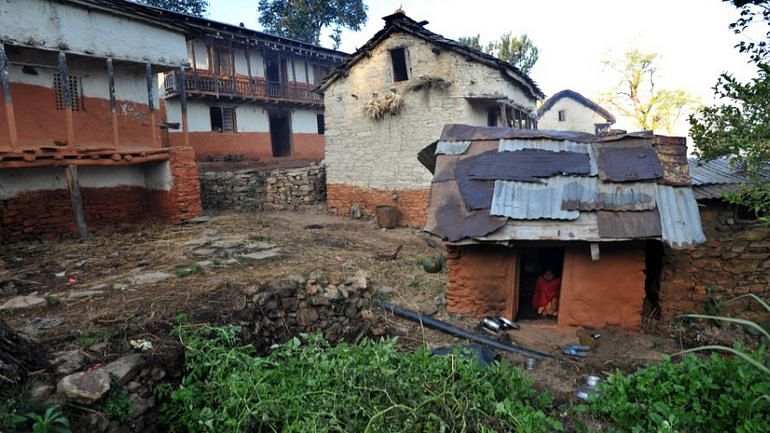 A woman  banished to a windowless ‘menstruation hut’also known as Chhaupadi hut.