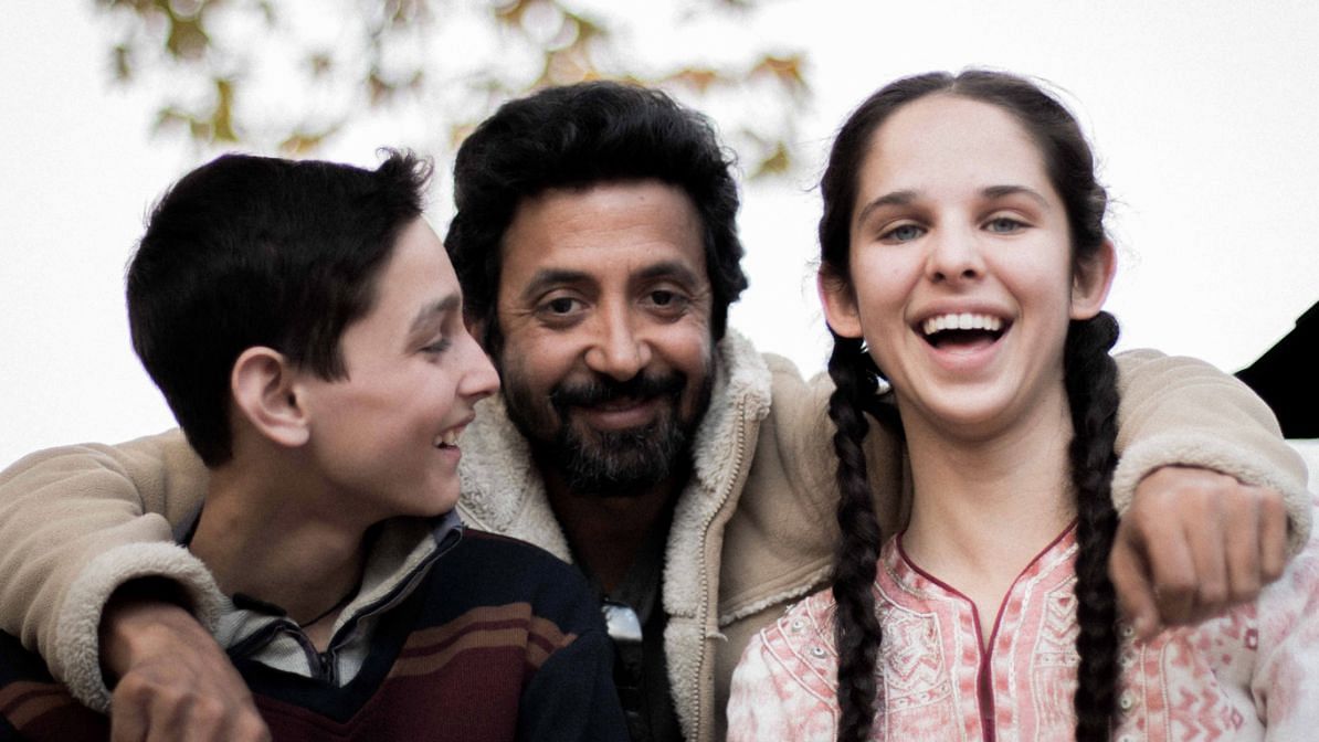 Filmmaker Ashvin Kumar with Shivam Raina and Zara Webb, the actors of <i>No Fathers In Kashmir.</i>