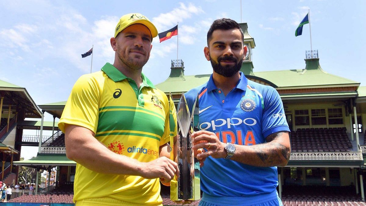Captains Aaron Finch and Virat Kohli pose with the trophy ahead of India’s three-match ODI series in Australia.