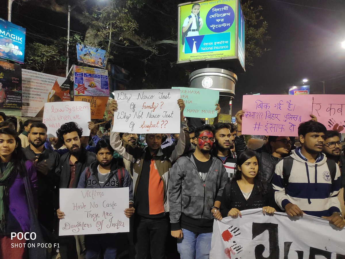A slogan reads ‘Victims Have No Caste, They are Daughters of India’.