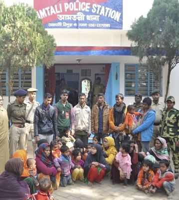 Agartala: 31 Rohingya Muslims who were trying to enter Bangladesh from India and were detained by the Border Security Force (BSF) along the India-Bangladesh International Border, being handed over to Amtali Police in Agartala, on Jan 22, 2019. (Photo: IANS)