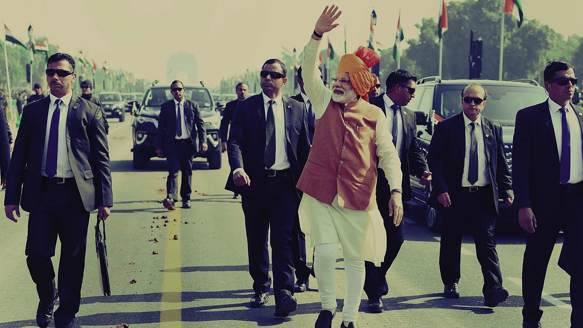 Prime Minister Narendra Modi waves at crowd during 70th Republic Day celebrations at Rajpath in New Delhi, Saturday, 26 January. 