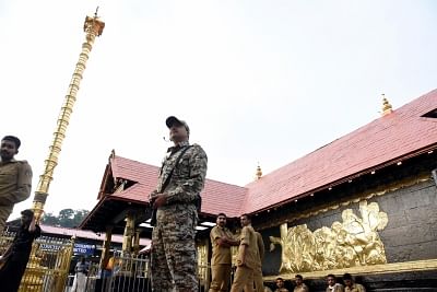 Pathanamthitta: A security personnel stands guard at the Sabarimala temple in Kerala