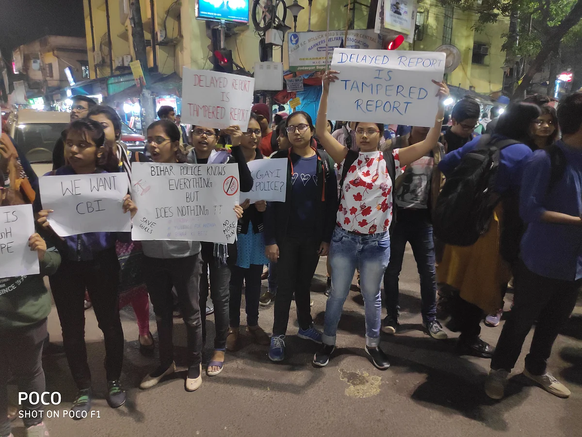 A slogan reads ‘Delayed Report is Tampered Report’.