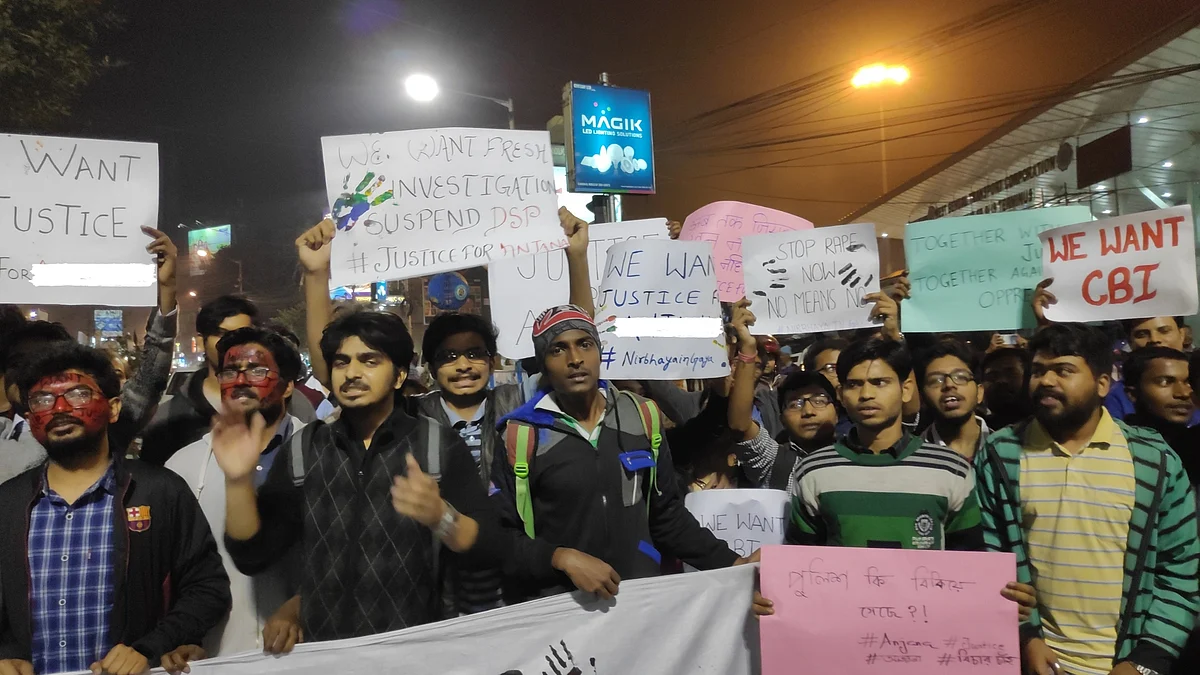 Students shout slogans at the protest.