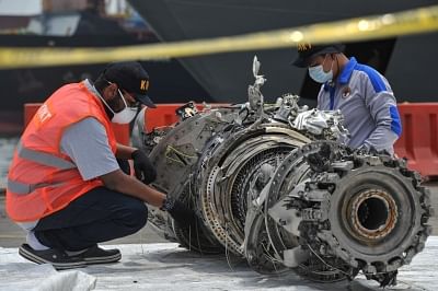 JAKARTA, Nov. 4, 2018 (Xinhua) -- Investigators check debris of Lion Air JT 610 at Tanjung Priok Port in Jakarta, Indonesia, Nov. 4, 2018. (Xinhua/Veri Sanovri/IANS)