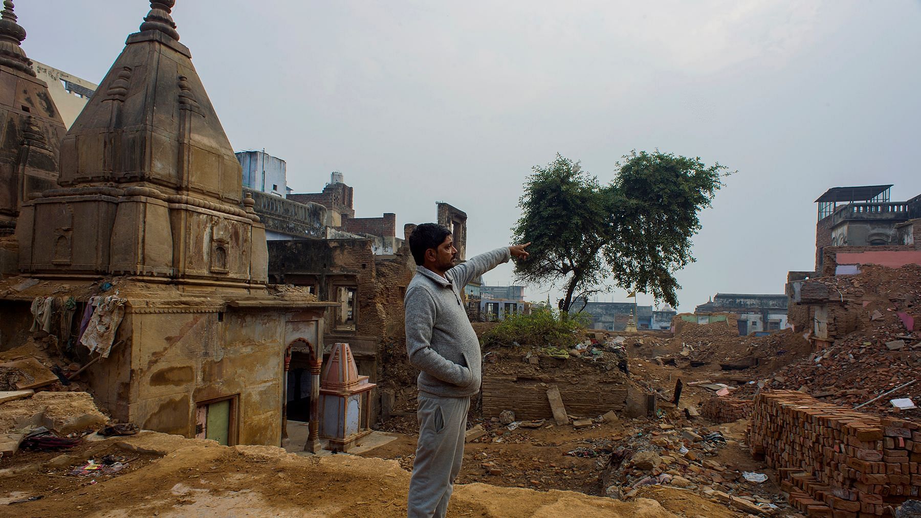 Prabhu Singh points towards his house that he refuses to part with unless he gets the amount he wants as compensation.