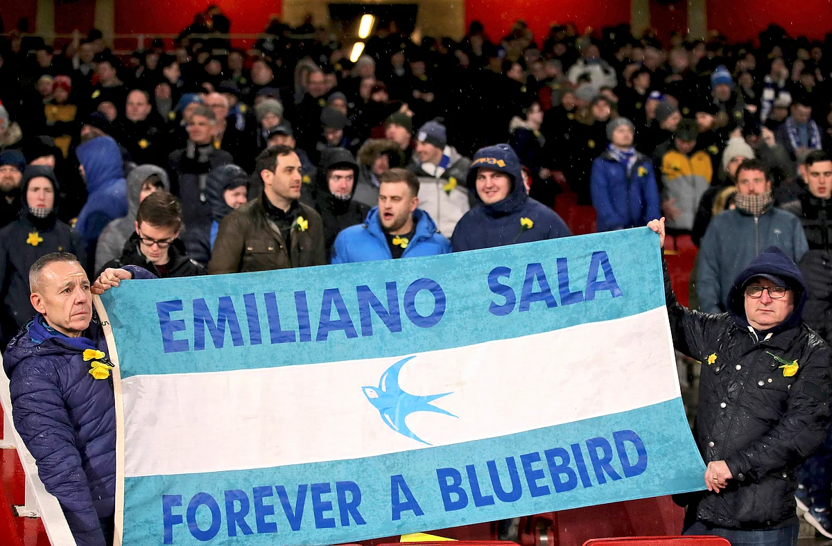 Cardiff City fans in the stands with a flag reading ‘Emiliano Sala Forever a Bluebird’ during the Premier League match at the Emirates Stadium, London.