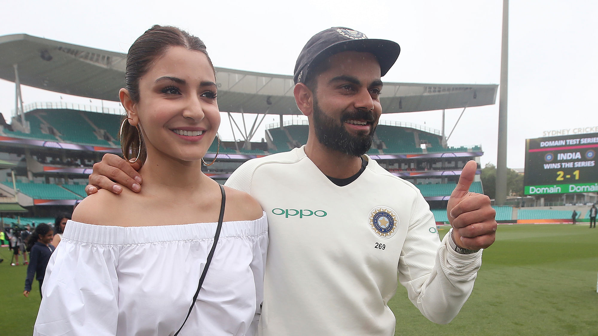 India’s cricket captain Virat Kohli, right, walks with his wife, Anushka Sharma celebrates India’s series win over Australia after play was called off on day 5 of their cricket test match in Sydney, Monday, Jan. 7, 2019.&nbsp;