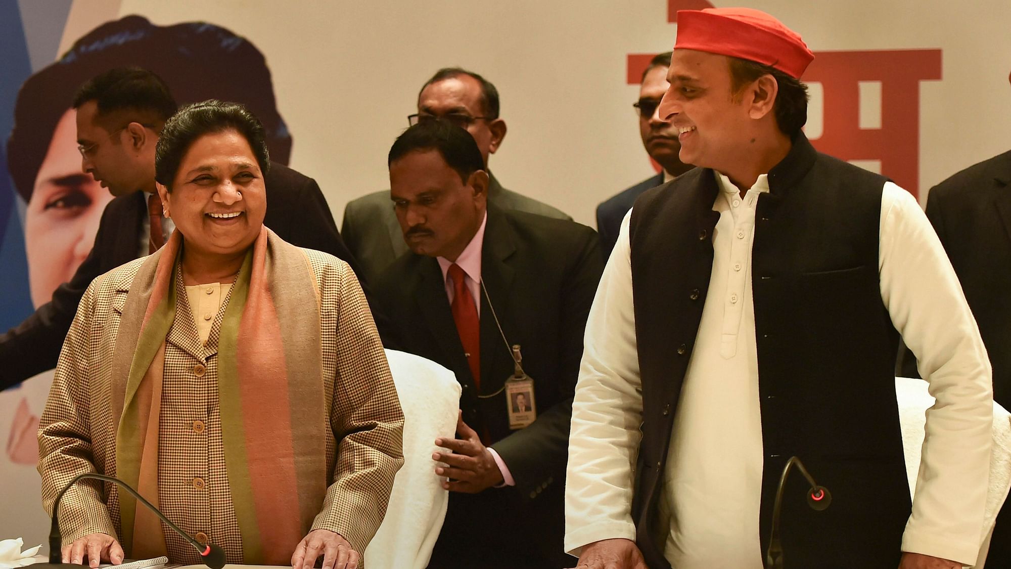 Bahujan Samaj Party leader Mayawati, left, and Samajwadi Party chief Akhilesh Yadav.