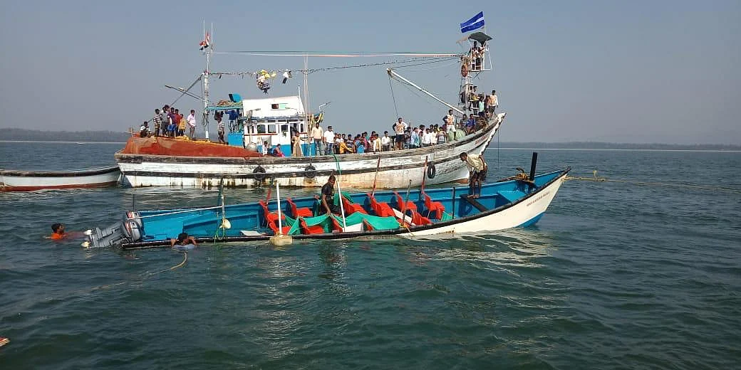 Rescue operations in Karnataka’s Karwar after a boat capsized.