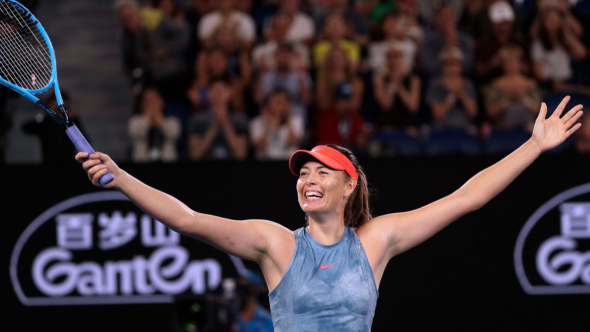 Russia’s Maria Sharapova celebrates after defeating Denmark’s Caroline Wozniacki in their third round match at the Australian Open.