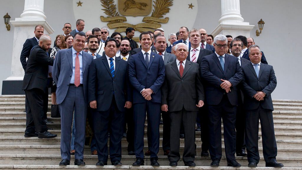 Juan Guaido, front center, poses for a photo with his colleagues prior to a special session of the National Assembly in Caracas, Venezuela.&nbsp;