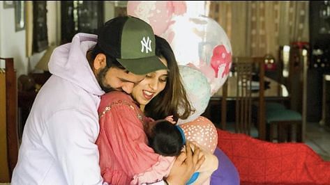 The 31-year-old batsman took to Instagram to share a photo with his wife and baby.