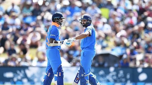 A 154-run opening partnership between Shikhar Dhawan and Rohit Sharma set India on course to a 90-run win over New Zealand.