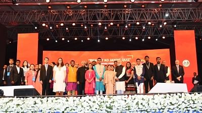 Varanasi: Prime Minister Narendra Modi, Mauritian Prime Minister Pravind Jugnauth and External Affairs Minister Sushma Swaraj with the winners of "Bharat Ko Janiye Quiz" at the inauguration of 15th Pravasi Bharatiya Divas in Varanasi, on Jan 22, 2019. (Photo: IANS/MEA)