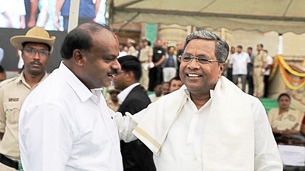 Karnataka Chief Minister HD Kumaraswamy (left) with former CM Siddaramaiah.