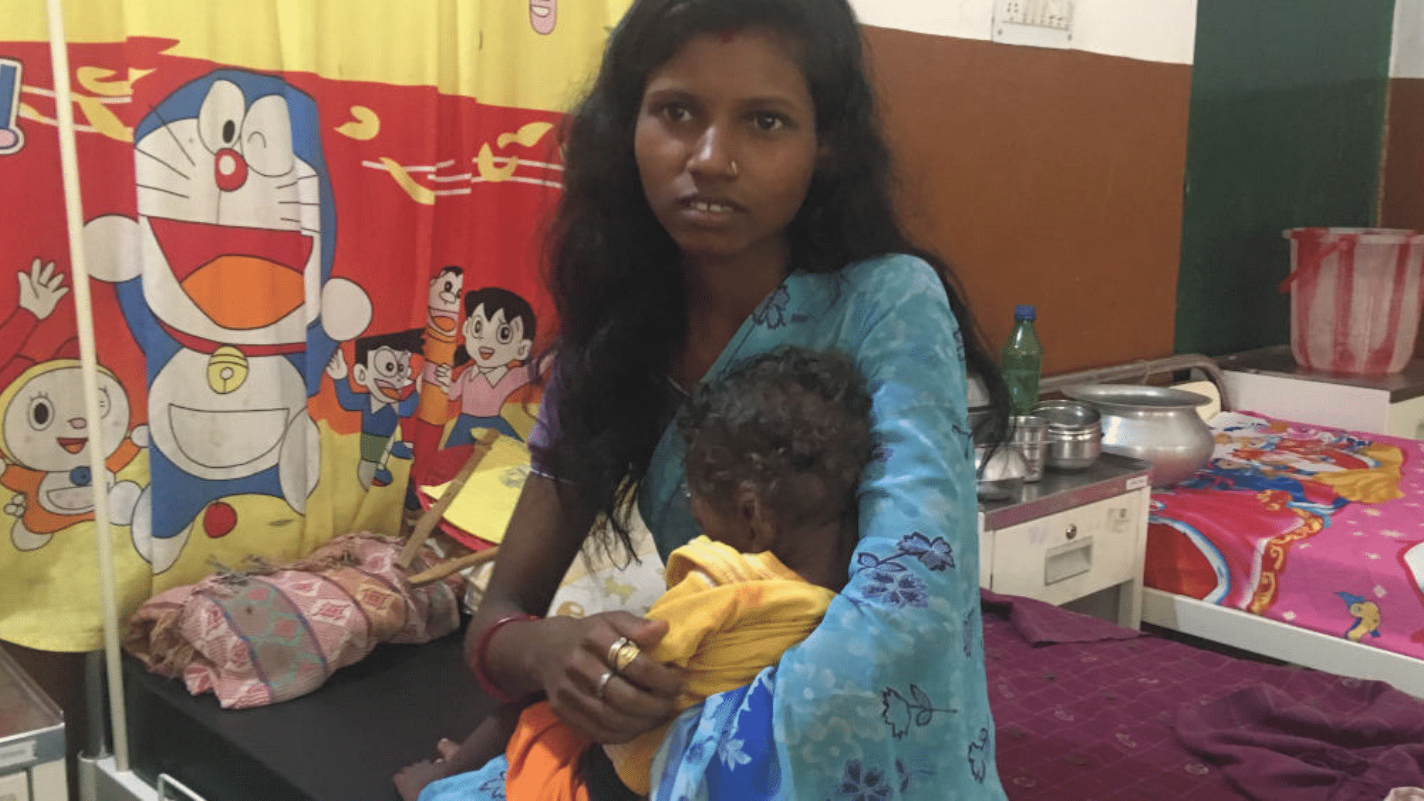 Purnima Devi (25) with her 21-month-old child, diagnosed with severe acute malnourishment.&nbsp; &nbsp;
